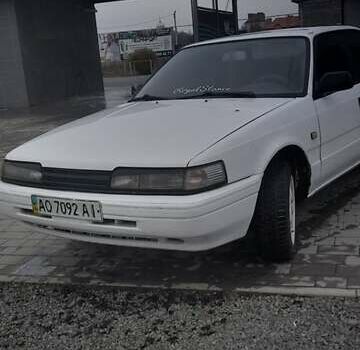 Белый Мазда 626, объемом двигателя 2 л и пробегом 323 тыс. км за 900 $, фото 1 на Automoto.ua