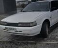 Белый Мазда 626, объемом двигателя 2 л и пробегом 323 тыс. км за 900 $, фото 1 на Automoto.ua