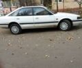 Белый Мазда 626, объемом двигателя 2 л и пробегом 296 тыс. км за 3000 $, фото 1 на Automoto.ua