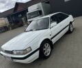 Белый Мазда 626, объемом двигателя 2 л и пробегом 200 тыс. км за 1350 $, фото 1 на Automoto.ua