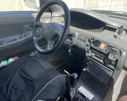 Білий Мазда 626, об'ємом двигуна 2 л та пробігом 392 тис. км за 1700 $, фото 4 на Automoto.ua