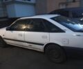 Белый Мазда 626, объемом двигателя 2 л и пробегом 380 тыс. км за 1231 $, фото 1 на Automoto.ua