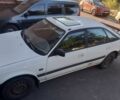 Белый Мазда 626, объемом двигателя 2 л и пробегом 380 тыс. км за 1231 $, фото 1 на Automoto.ua