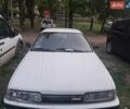 Білий Мазда 626, об'ємом двигуна 1.8 л та пробігом 510 тис. км за 916 $, фото 1 на Automoto.ua