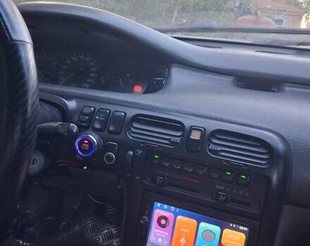 Белый Мазда 626, объемом двигателя 2 л и пробегом 300 тыс. км за 2450 $, фото 2 на Automoto.ua