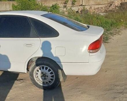 Белый Мазда 626, объемом двигателя 1.8 л и пробегом 500 тыс. км за 1700 $, фото 1 на Automoto.ua