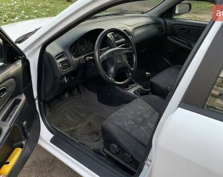 Білий Мазда 626, об'ємом двигуна 1.8 л та пробігом 321 тис. км за 3500 $, фото 3 на Automoto.ua