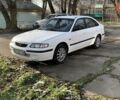 Белый Мазда 626, объемом двигателя 1.8 л и пробегом 321 тыс. км за 3525 $, фото 1 на Automoto.ua
