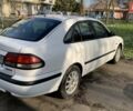 Білий Мазда 626, об'ємом двигуна 1.8 л та пробігом 321 тис. км за 3476 $, фото 4 на Automoto.ua