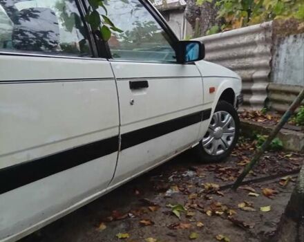 Белый Мазда 626, объемом двигателя 2 л и пробегом 344 тыс. км за 800 $, фото 4 на Automoto.ua