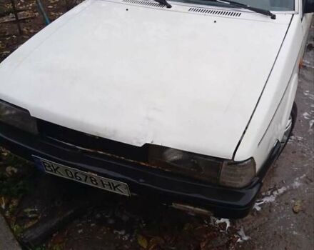 Белый Мазда 626, объемом двигателя 2 л и пробегом 344 тыс. км за 800 $, фото 1 на Automoto.ua