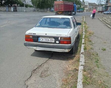 Белый Мазда 626, объемом двигателя 1.6 л и пробегом 320 тыс. км за 579 $, фото 1 на Automoto.ua
