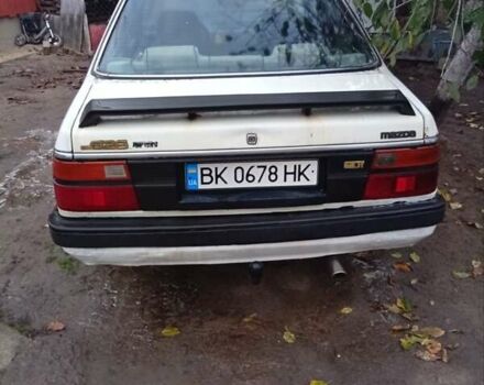 Белый Мазда 626, объемом двигателя 2 л и пробегом 344 тыс. км за 800 $, фото 5 на Automoto.ua