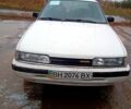Белый Мазда 626, объемом двигателя 2.2 л и пробегом 300 тыс. км за 1100 $, фото 1 на Automoto.ua