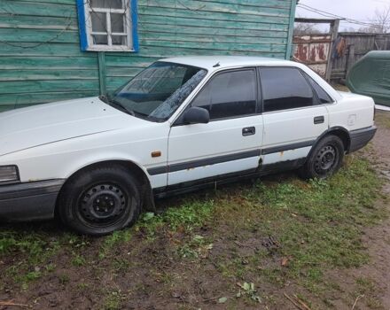 Белый Мазда 626, объемом двигателя 2 л и пробегом 1 тыс. км за 831 $, фото 1 на Automoto.ua