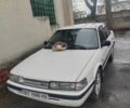 Білий Мазда 626, об'ємом двигуна 2 л та пробігом 200 тис. км за 701 $, фото 1 на Automoto.ua