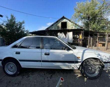 Белый Мазда 626, объемом двигателя 2 л и пробегом 429 тыс. км за 953 $, фото 3 на Automoto.ua