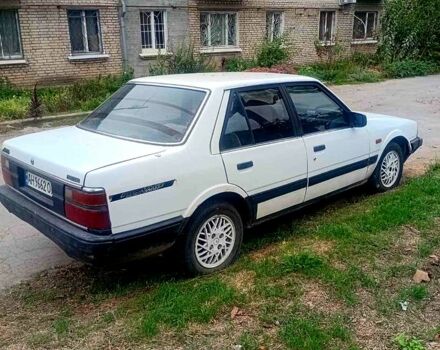 Білий Мазда 626, об'ємом двигуна 2 л та пробігом 300 тис. км за 450 $, фото 1 на Automoto.ua