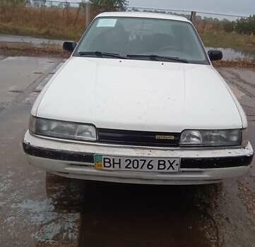 Білий Мазда 626, об'ємом двигуна 2.18 л та пробігом 300 тис. км за 1100 $, фото 1 на Automoto.ua