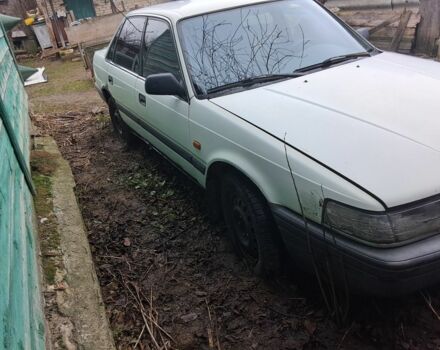 Белый Мазда 626, объемом двигателя 2 л и пробегом 1 тыс. км за 831 $, фото 2 на Automoto.ua