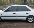 Белый Мазда 626, объемом двигателя 2.18 л и пробегом 300 тыс. км за 1100 $, фото 2 на Automoto.ua