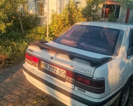 Белый Мазда 626, объемом двигателя 2 л и пробегом 268 тыс. км за 65000 $, фото 2 на Automoto.ua