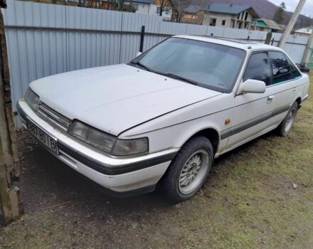 Белый Мазда 626, объемом двигателя 2 л и пробегом 300 тыс. км за 300 $, фото 3 на Automoto.ua