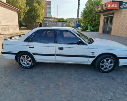 Белый Мазда 626, объемом двигателя 2 л и пробегом 499 тыс. км за 1700 $, фото 3 на Automoto.ua