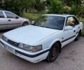 Белый Мазда 626, объемом двигателя 2 л и пробегом 400 тыс. км за 2523 $, фото 1 на Automoto.ua