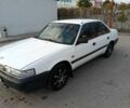Белый Мазда 626, объемом двигателя 1.8 л и пробегом 360 тыс. км за 1700 $, фото 1 на Automoto.ua
