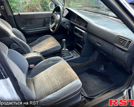 Белый Мазда 626, объемом двигателя 1.8 л и пробегом 310 тыс. км за 700 $, фото 8 на Automoto.ua