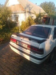 Белый Мазда 626, объемом двигателя 2 л и пробегом 268 тыс. км за 65000 $, фото 1 на Automoto.ua