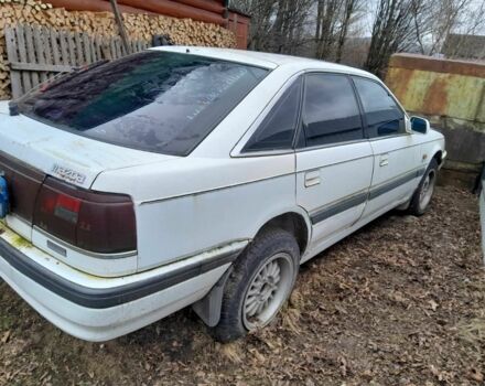 Белый Мазда 626, объемом двигателя 2 л и пробегом 300 тыс. км за 300 $, фото 2 на Automoto.ua