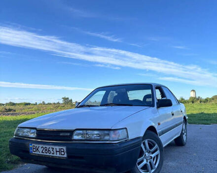 Белый Мазда 626, объемом двигателя 2 л и пробегом 350 тыс. км за 1300 $, фото 5 на Automoto.ua