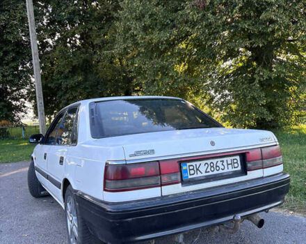 Белый Мазда 626, объемом двигателя 2 л и пробегом 350 тыс. км за 1300 $, фото 4 на Automoto.ua