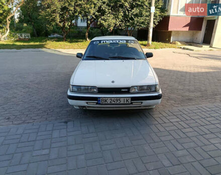 Белый Мазда 626, объемом двигателя 2 л и пробегом 499 тыс. км за 1700 $, фото 4 на Automoto.ua