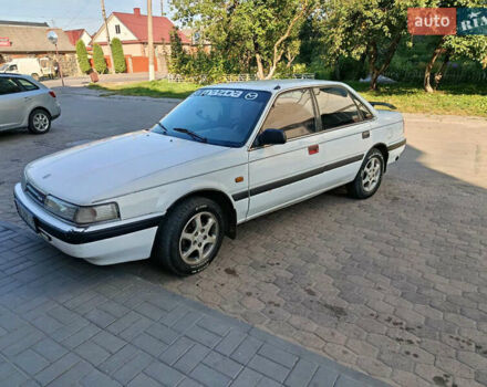 Белый Мазда 626, объемом двигателя 2 л и пробегом 499 тыс. км за 1700 $, фото 2 на Automoto.ua