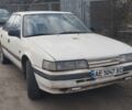 Белый Мазда 626, объемом двигателя 2 л и пробегом 380 тыс. км за 903 $, фото 1 на Automoto.ua