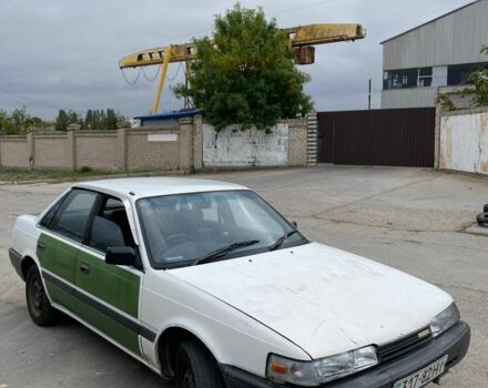 Белый Мазда 626, объемом двигателя 2 л и пробегом 111 тыс. км за 607 $, фото 2 на Automoto.ua