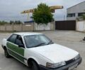 Белый Мазда 626, объемом двигателя 2 л и пробегом 111 тыс. км за 607 $, фото 2 на Automoto.ua