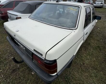 Белый Мазда 626, объемом двигателя 0 л и пробегом 300 тыс. км за 285 $, фото 3 на Automoto.ua