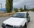 Белый Мазда 626, объемом двигателя 2 л и пробегом 111 тыс. км за 607 $, фото 1 на Automoto.ua