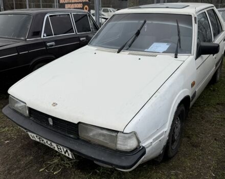 Белый Мазда 626, объемом двигателя 0 л и пробегом 300 тыс. км за 285 $, фото 1 на Automoto.ua