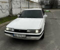 Білий Мазда 626, об'ємом двигуна 2 л та пробігом 412 тис. км за 2500 $, фото 9 на Automoto.ua
