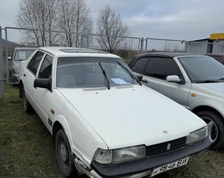 Белый Мазда 626, объемом двигателя 0 л и пробегом 300 тыс. км за 285 $, фото 4 на Automoto.ua