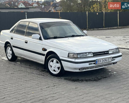 Белый Мазда 626, объемом двигателя 1.98 л и пробегом 300 тыс. км за 1100 $, фото 1 на Automoto.ua