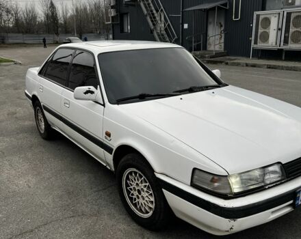 Белый Мазда 626, объемом двигателя 2 л и пробегом 412 тыс. км за 2500 $, фото 3 на Automoto.ua