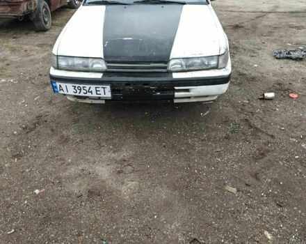 Белый Мазда 626, объемом двигателя 2 л и пробегом 300 тыс. км за 656 $, фото 2 на Automoto.ua