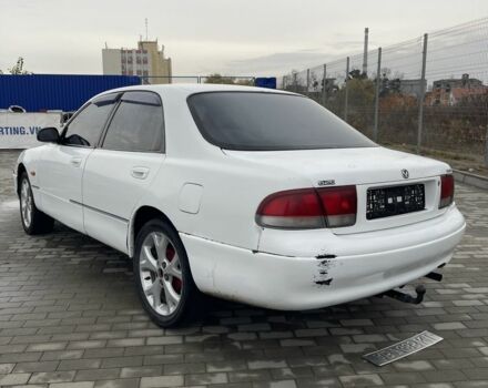 Белый Мазда 626, объемом двигателя 2 л и пробегом 300 тыс. км за 1099 $, фото 2 на Automoto.ua