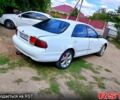 Белый Мазда 626, объемом двигателя 2 л и пробегом 315 тыс. км за 900 $, фото 3 на Automoto.ua